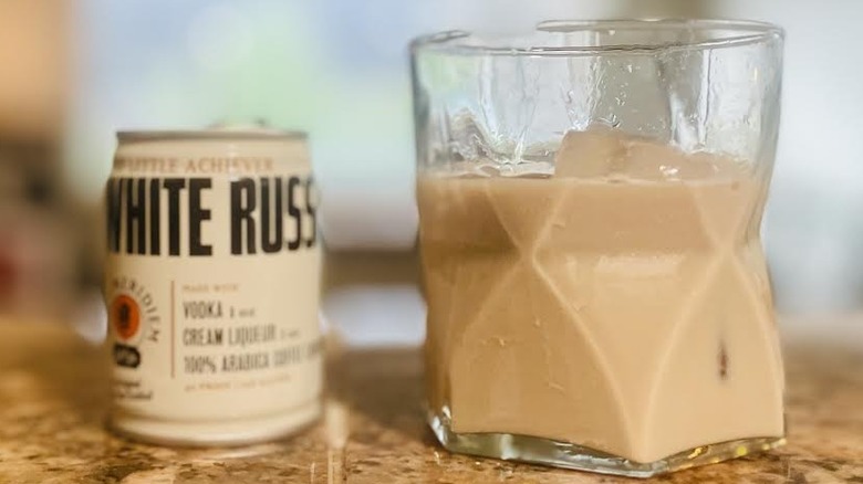 Can and glass of Post Meridiem White Russian