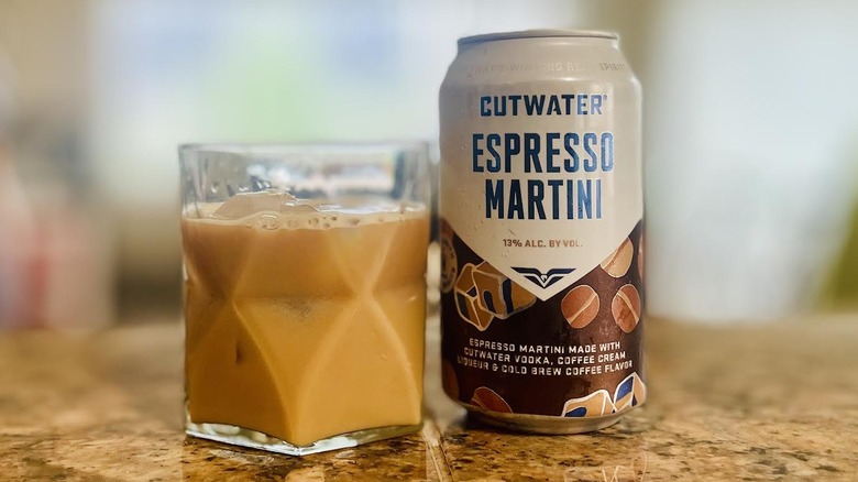 Glass and can of Cutwater Espresso Martini