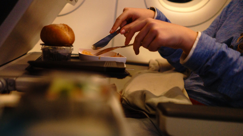 An in-flight meal at night