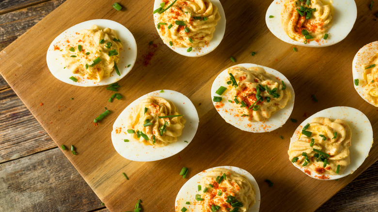 Close-up shot of deviled eggs on a cutting board