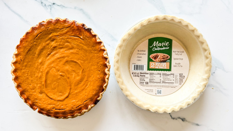 Marie Callender's pie crust packaging beside pumpkin pie