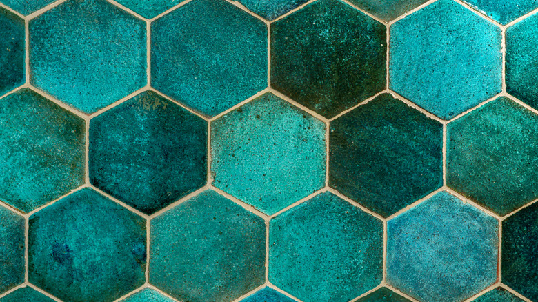 close of of dark teal hexagon tiles