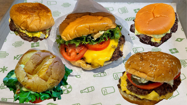 Several smash burgers from various chains