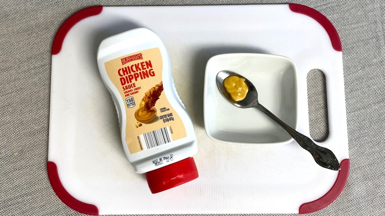 Aldi chicken dipping sauce displayed with a sample in a spoon