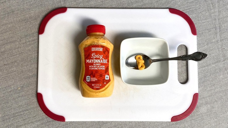 Aldi spicy mayonnaise displayed with a sample in a spoon