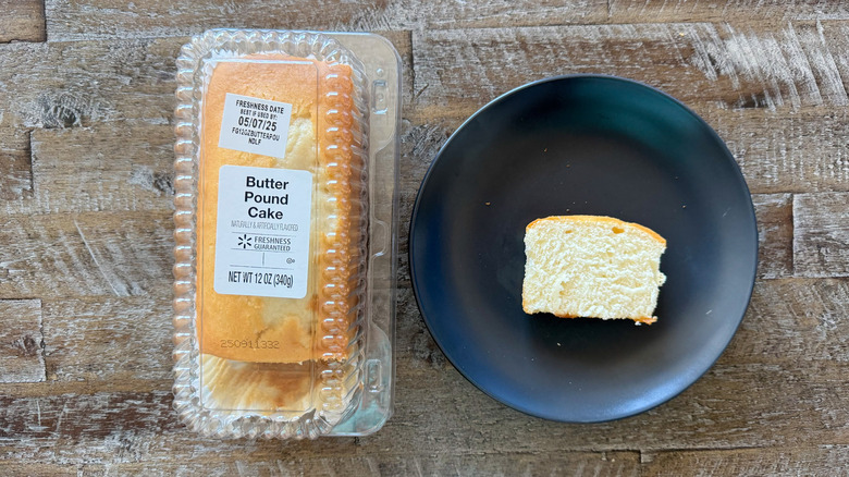 black plate with slice of butter pound cake on wooden surface