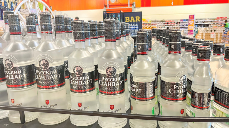 Rows of vodka in plastic bottles in a store