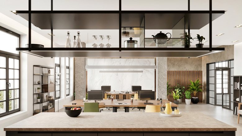 Bright, modern kitchen with shelves suspended from the ceiling