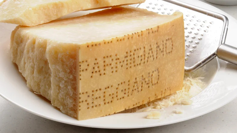 a rind of Parmigiano-Reggiano with cheese grater