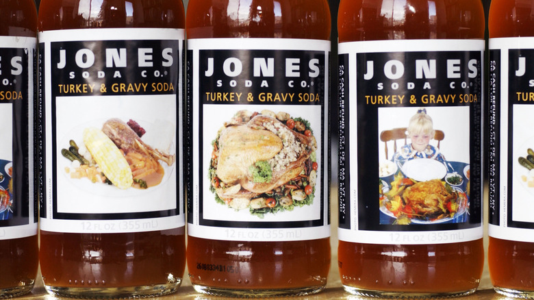 Close-up of a row of bottles of Jones Soda Turkey & Gravy flavor