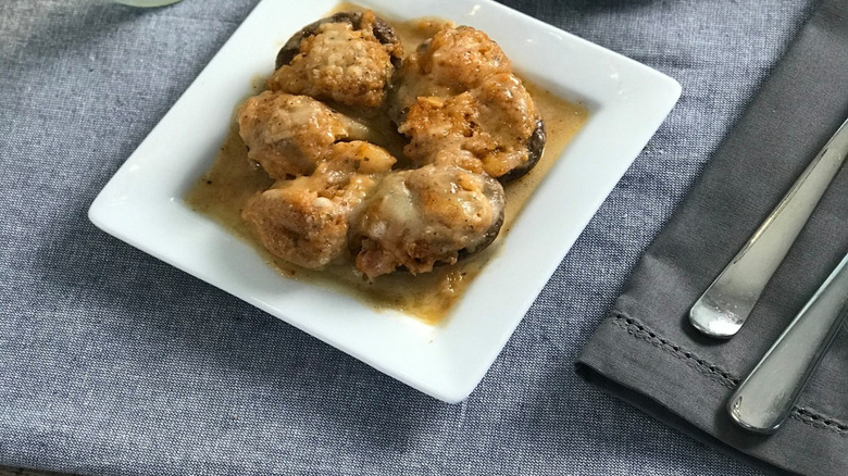 A seafood stuffed mushroom on a plate at Red Lobster