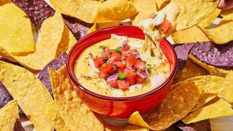 A bowl of crab queso with tortilla chips at Red Lobster