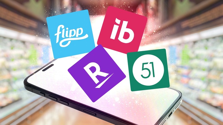 Phone in grocery store with a variety of grocery app logos