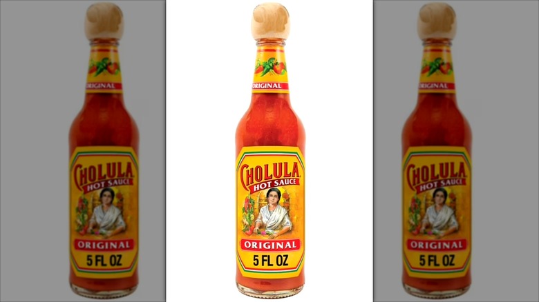 A bottle of Cholula against a white background