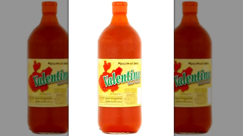 A bottle of Valetina against a white background