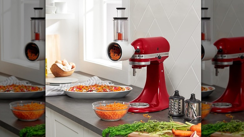 Mixer with bowl of shredded carrots