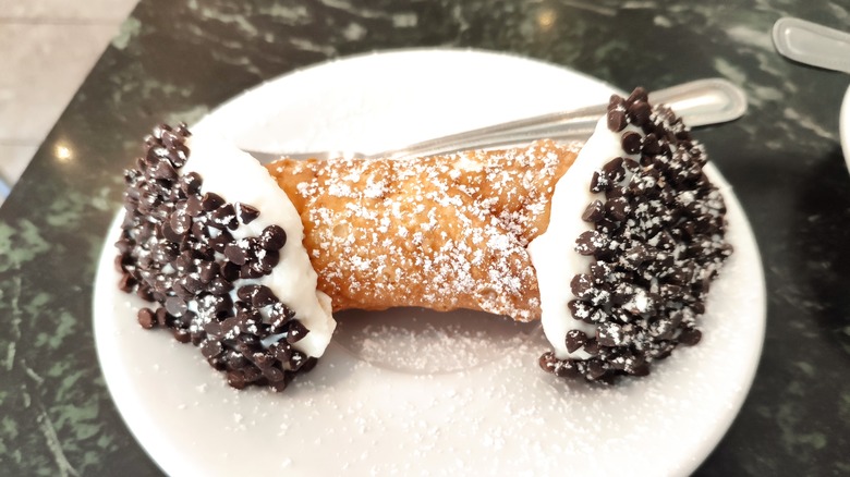 Cannoli on a plate with chocolate chips