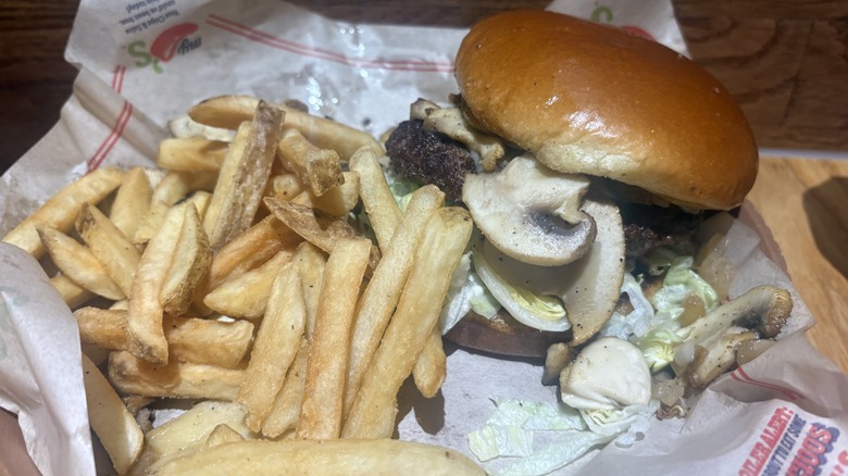 Mushroom Swiss Burger near French fries