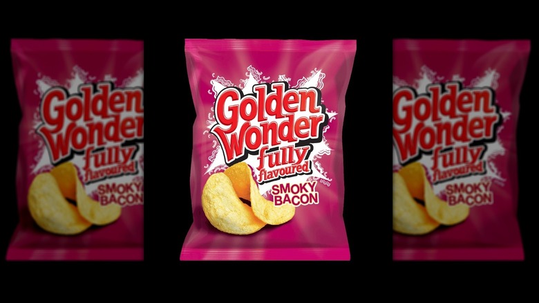 three bags of smoky bacon golden wonder crisps