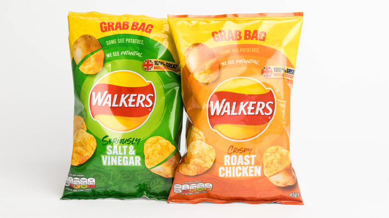 two bags of walkers with roast chicken and salt and vinegar
