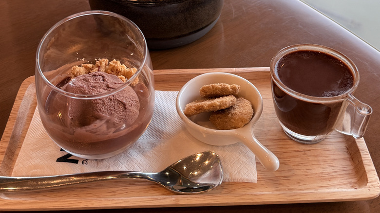A chocolate affogato on a serving tray on a table