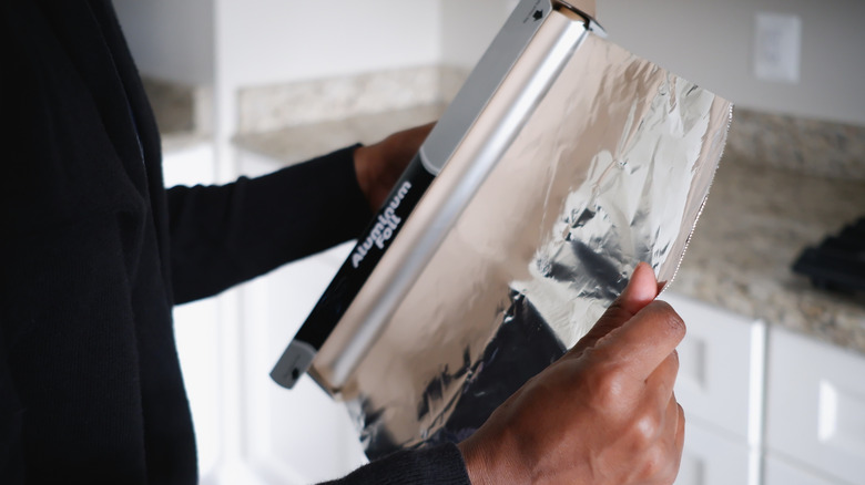 ripping off foil
