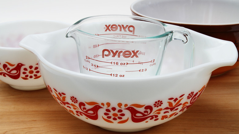 Vintage Pyrex bowl with measuring cup