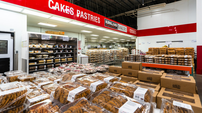 View of Costco's bakery department with assorted cookies and cakes on display