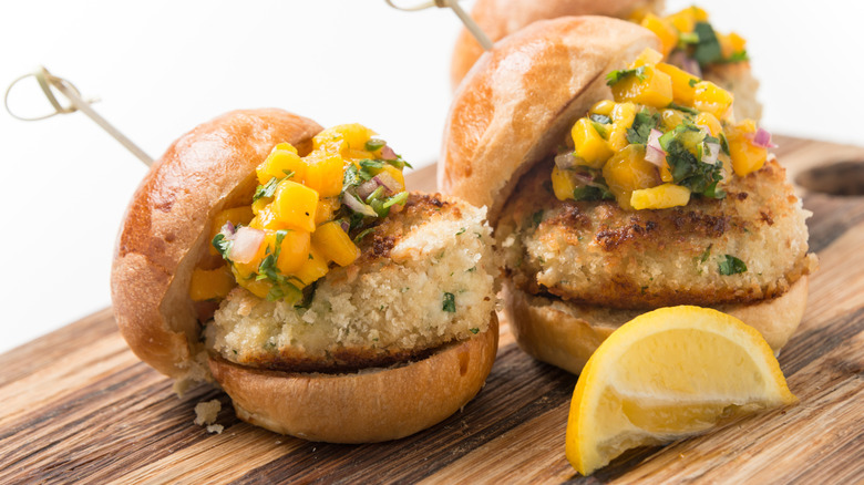 Sardine cake sliders with mango slaw and lemon