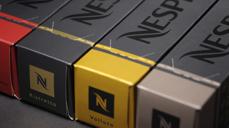 Three boxes of Nespresso pods.