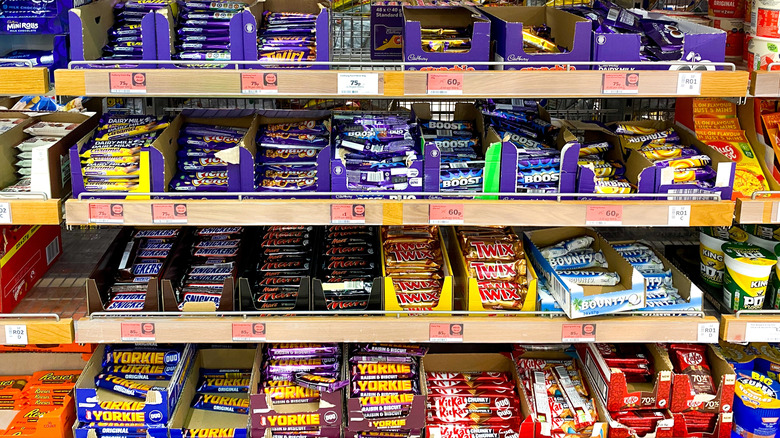 Chocolate bar disappearing into liquid chocolate