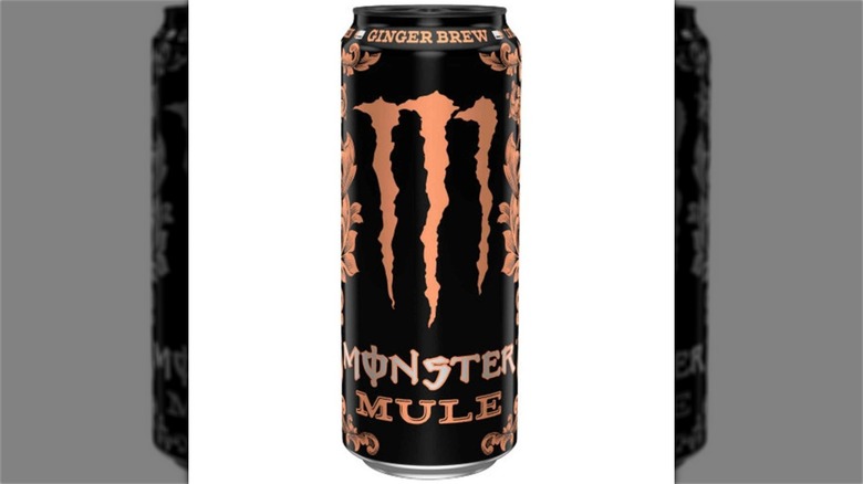 A can of Monster Mule Ginger Brew flanked by two low opacity, black and white versions of the same can