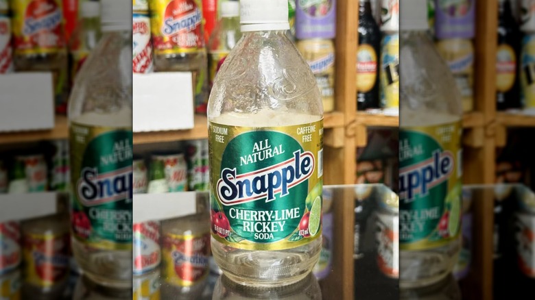 Empty glass bottle of Snapple Cherry-Lime Rickey soda