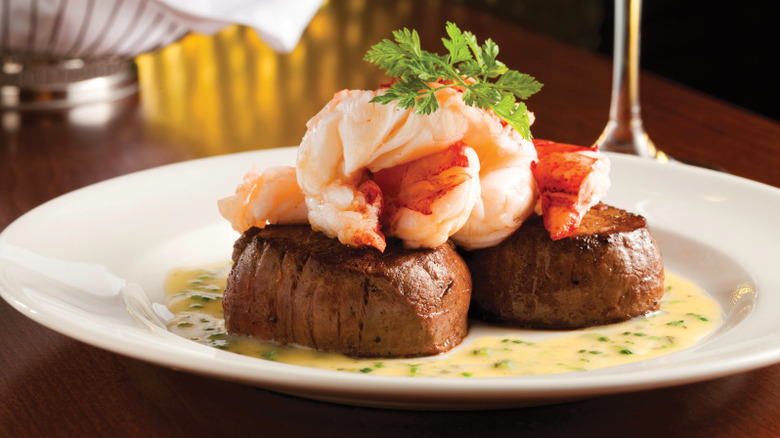 A shot of Capital Grille's Seared Tenderloin with Butter Poached Lobster Tails