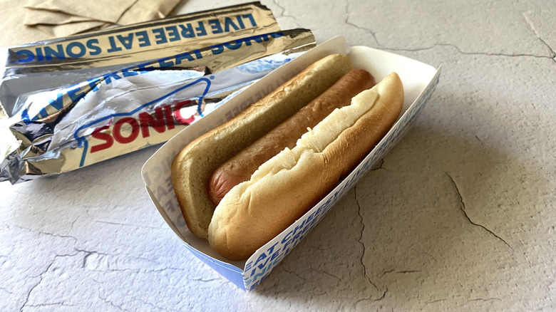 A Sonic hot dog in the take-out packaging