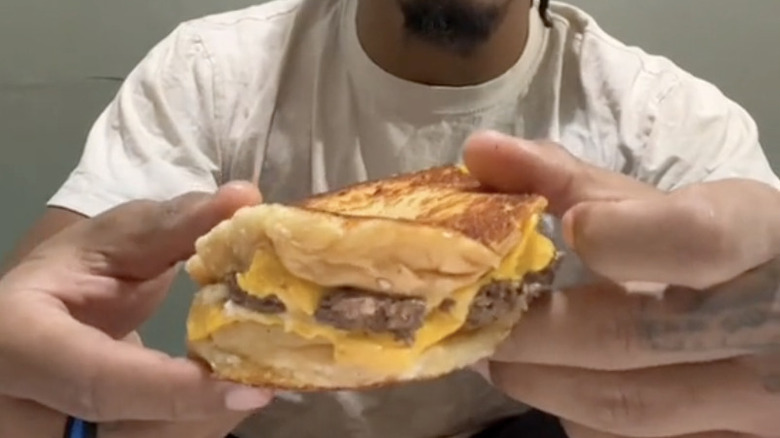 Tiktok screenshot of a Five Guys grilled cheese secret menu item