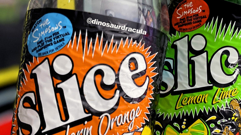 two bottles of Slice soda