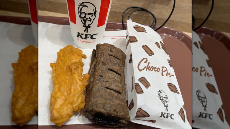 KFC Choco Pie next to its wrapper and a piece of Colonel Crispy chicken in Sapporo, Japan
