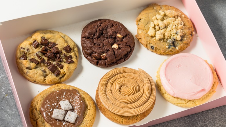 box of six different Crumbl Cookies