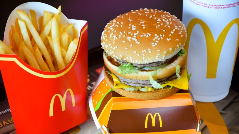 Mcdonald's fries and cheeseburger with drink