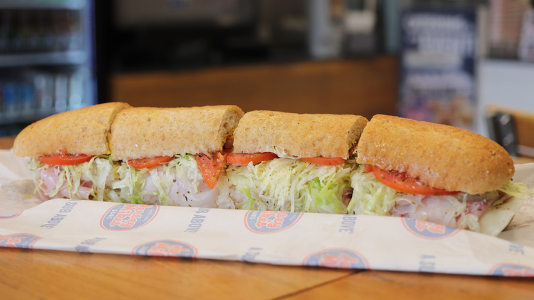 A Jersey Mike's Subs cut into four pieces