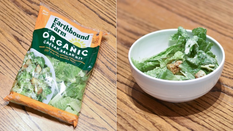 A package of organic Caesar salad next to a white bowl of salad