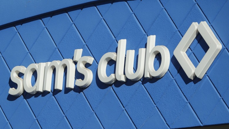 Up-close image of the Sam's Club store sign and logo on a blue background.