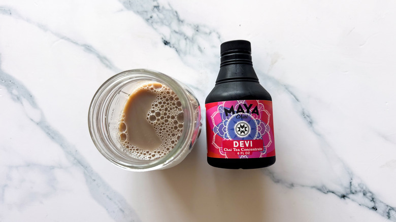 Maya chai latte concentrate on marble surface
