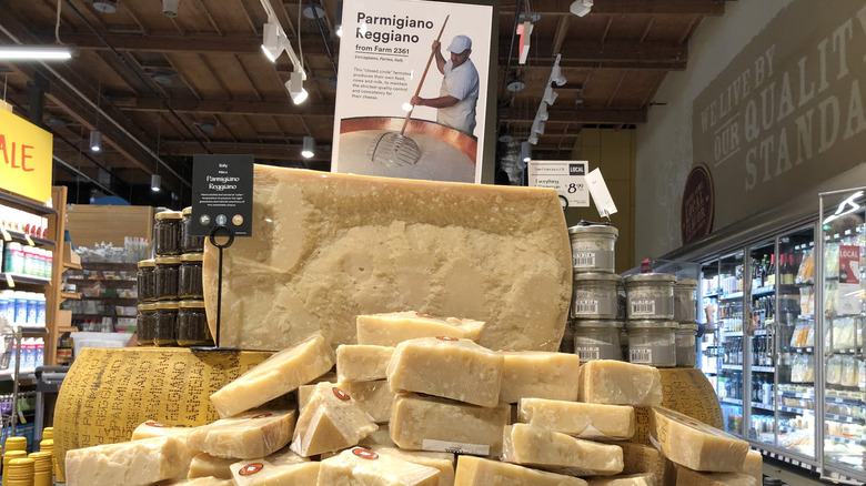 Parmigiano Reggiano cheese on display at Whole Foods