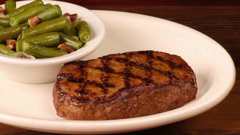 The Ranger Meal - Andy's Steak - a 6-ounce hand-cut sirloin steak with a portion of green beans in a bowl on the side.