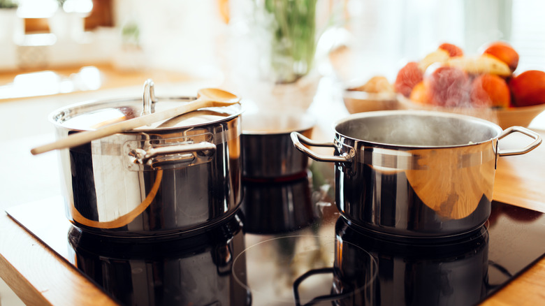 Stainless steel pans on a cooktop