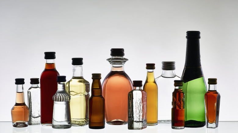 various liquor bottles of white background