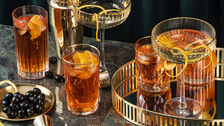 Cocktails and a shaker on a bar