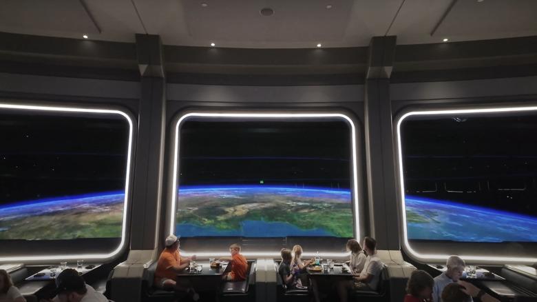 Interior of Space 220 restaurant with views of Earth from space